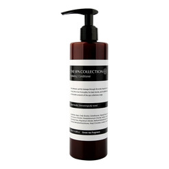 Premium conditioner with green tea fragrance by The Spa Collection in apothecary style bottle, aesthetic bathroom interior.